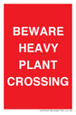 BEWARE HEAVY PLANT CROSSING Text: 